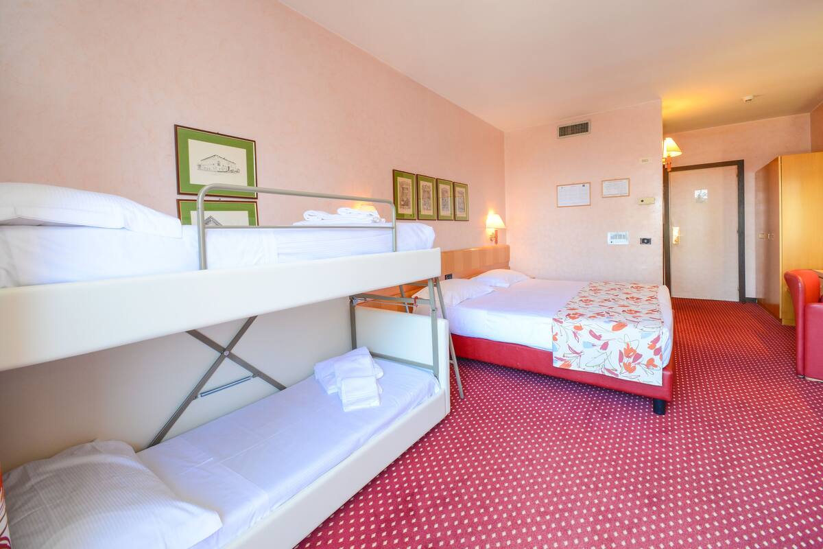 Quadruple Room, Lake View | Minibar, in-room safe, iron/ironing board (on request), alarm clocks