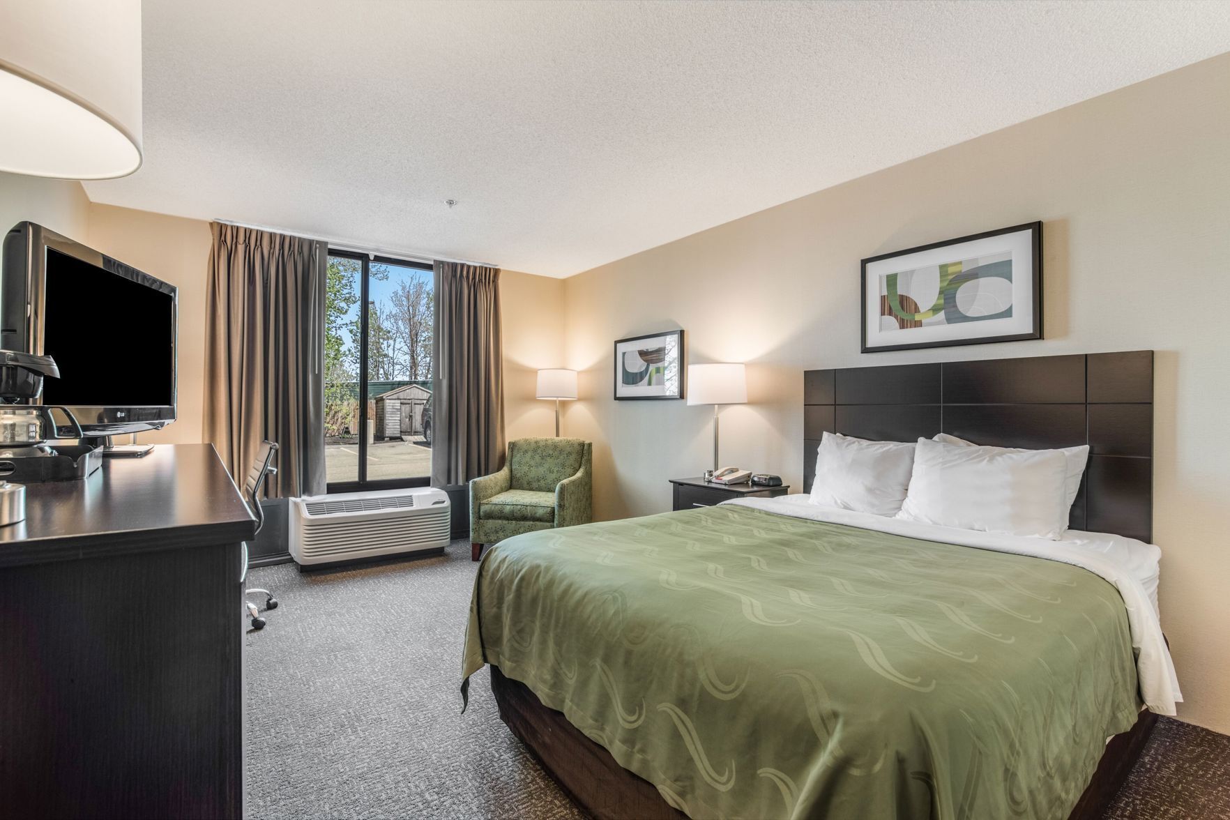 Premium bedding, down comforters, pillowtop beds, in-room safe