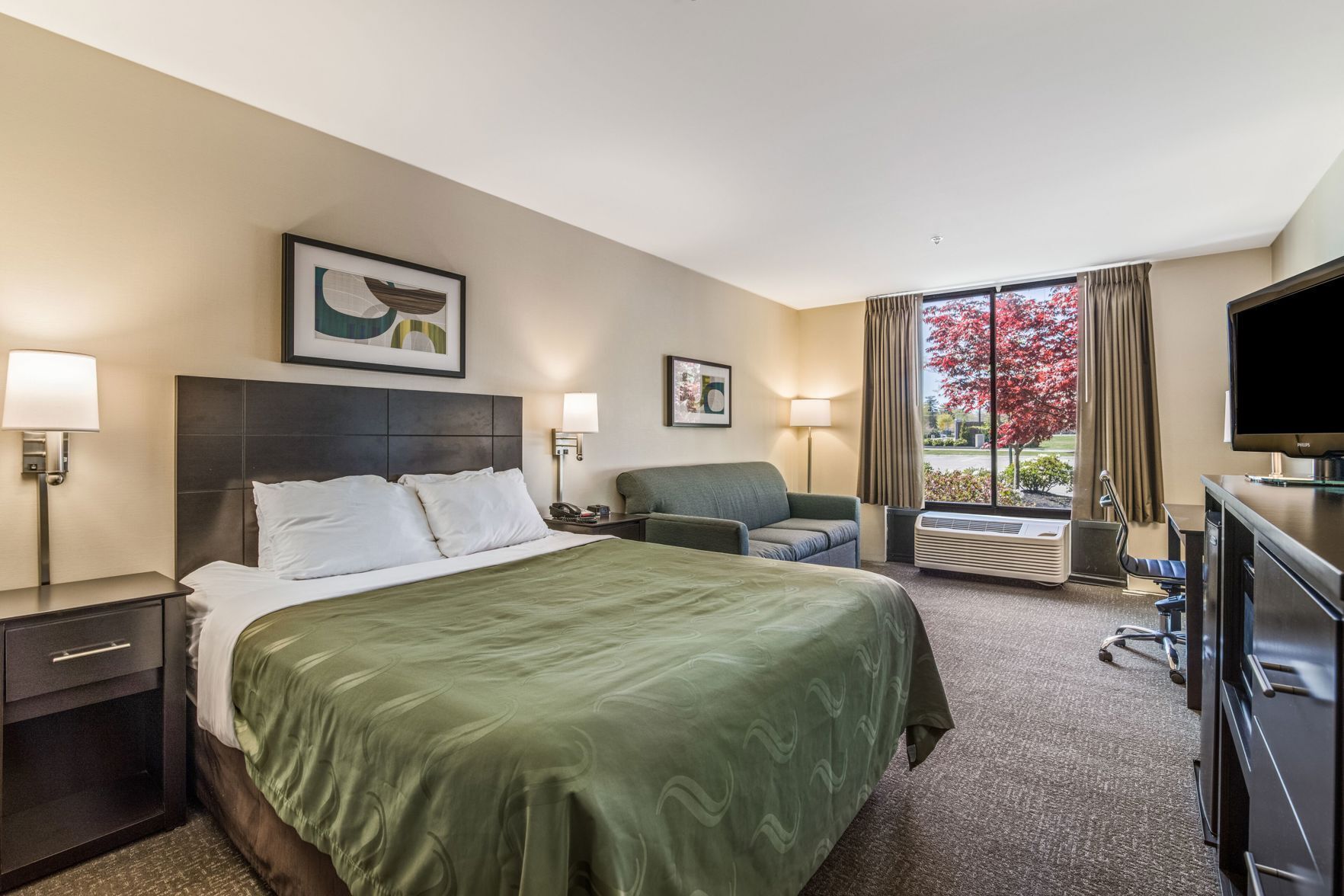 Premium bedding, down comforters, pillowtop beds, in-room safe