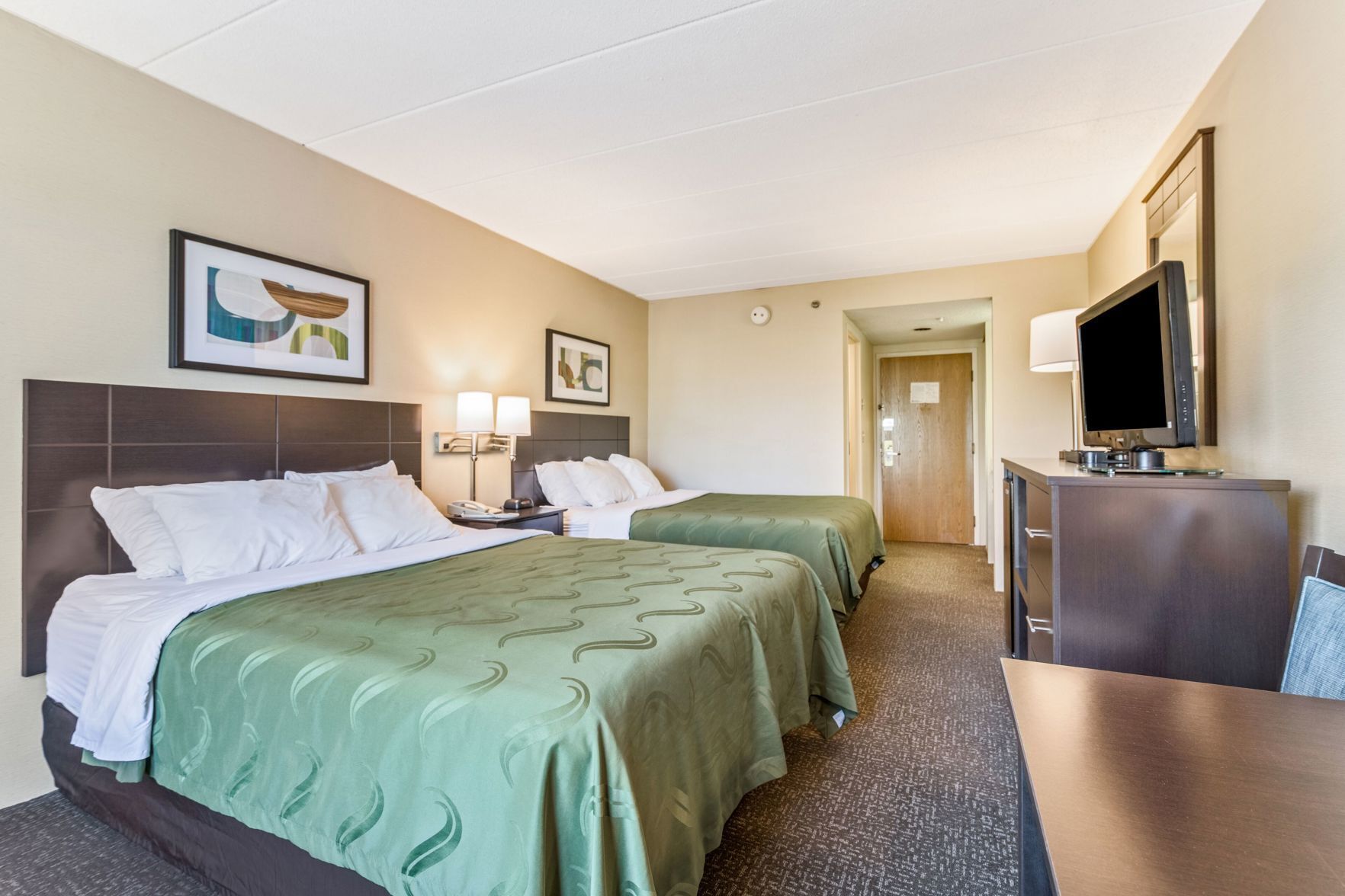 Premium bedding, down comforters, pillowtop beds, in-room safe
