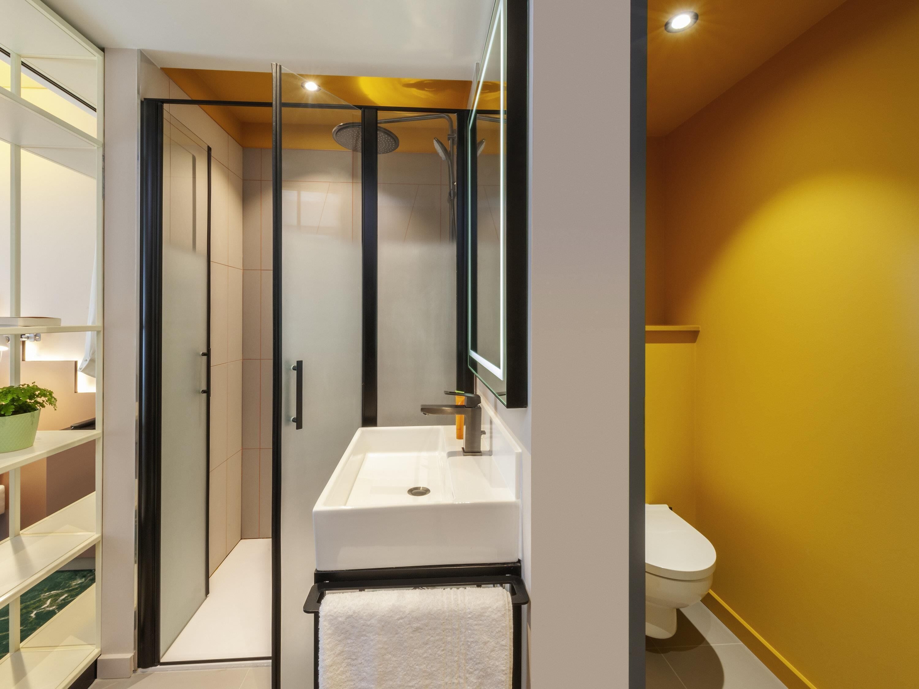 Premium bedding, desk, laptop workspace, blackout curtains