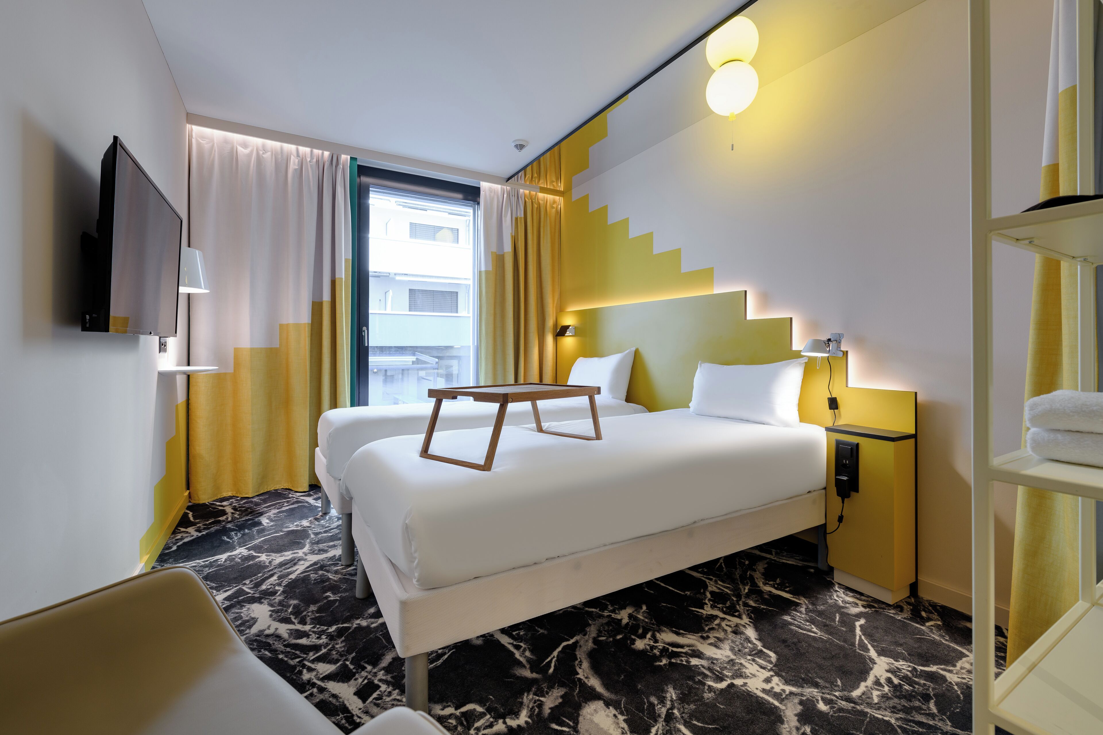 Premium bedding, desk, laptop workspace, blackout curtains