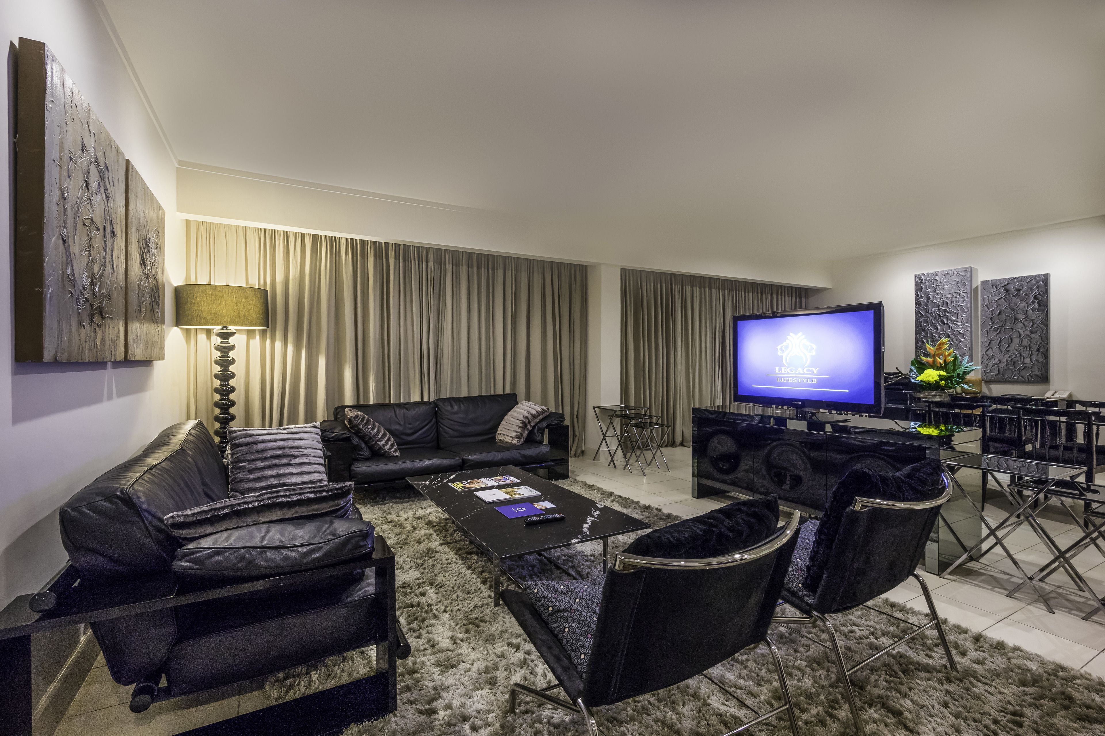 presidential suite | living area | 55-inch led tv with satellite channels, tv