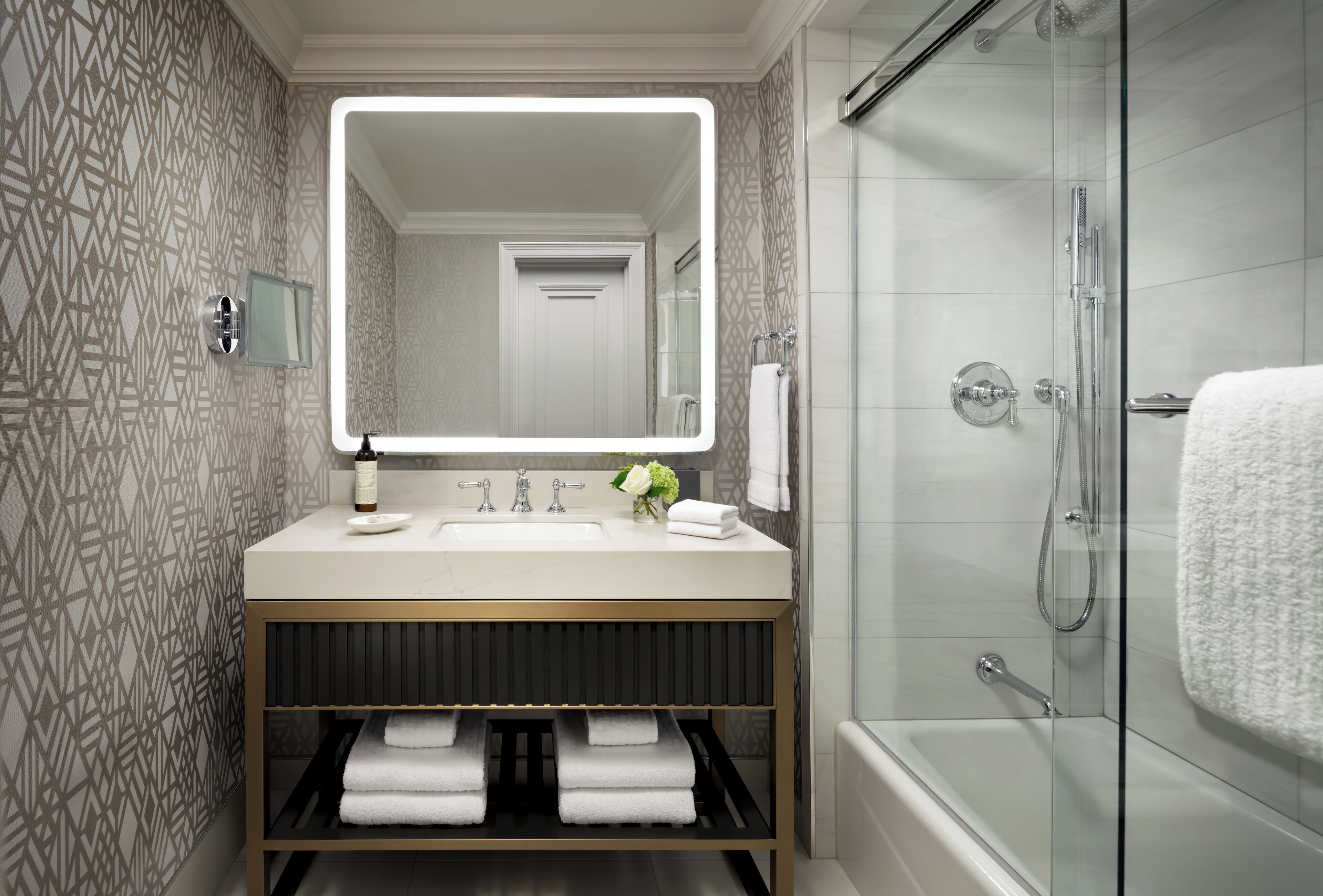 designer toiletries, hair dryer, bathrobes, towels