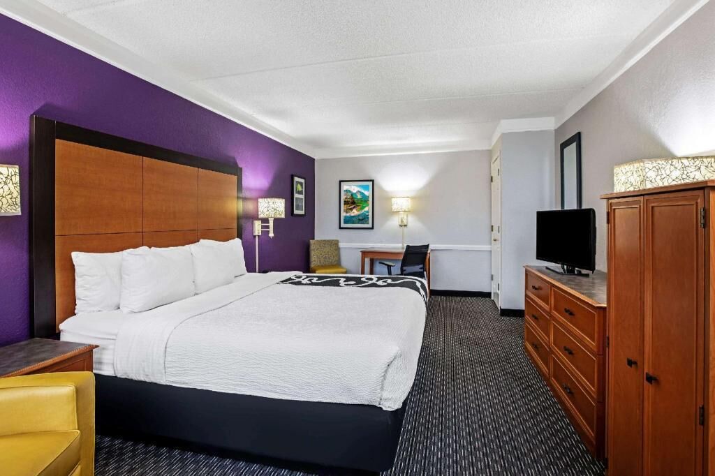 Premium bedding, desk, blackout curtains, iron/ironing board