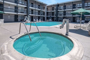 Seasonal outdoor pool, pool loungers