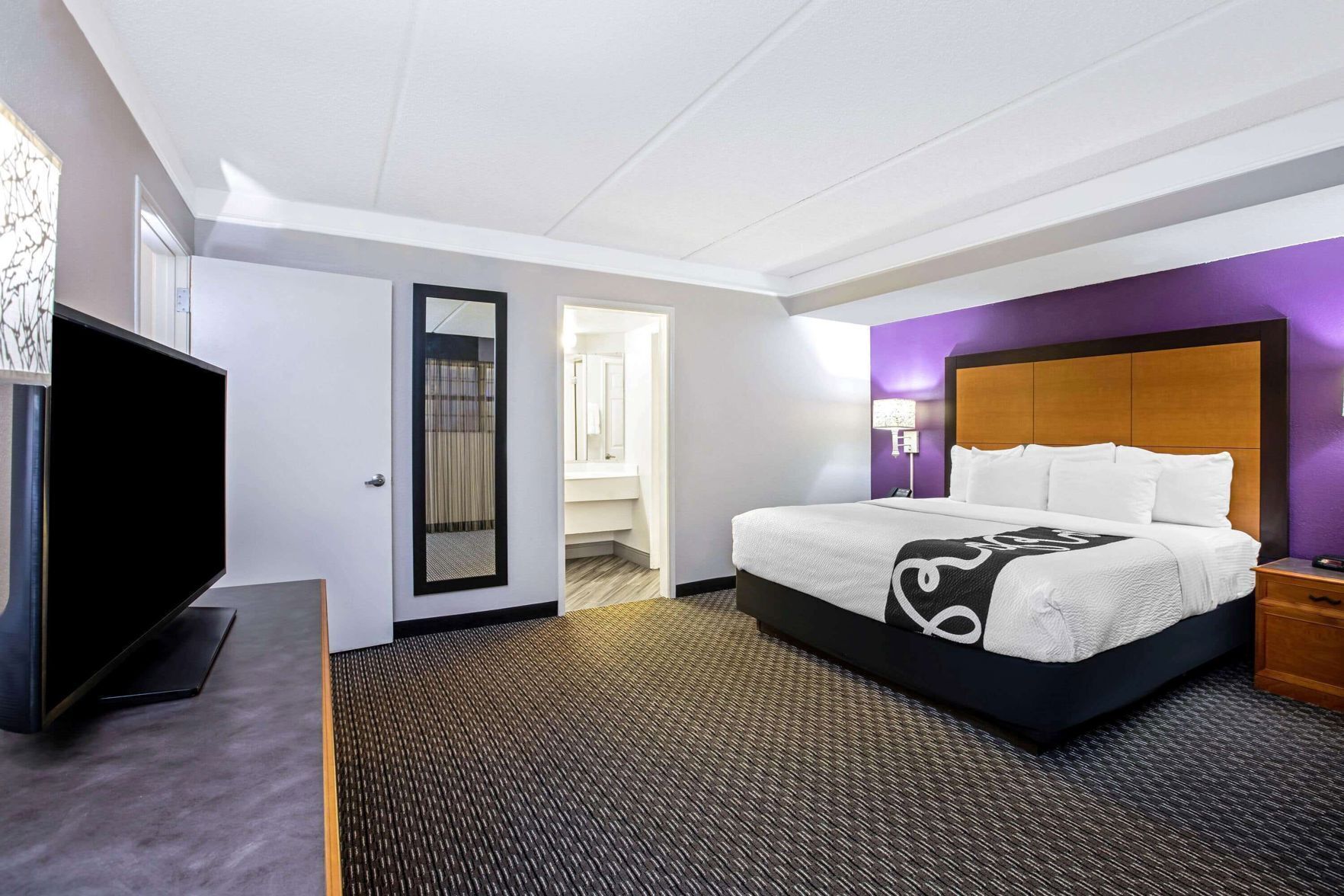 Premium bedding, desk, blackout curtains, iron/ironing board