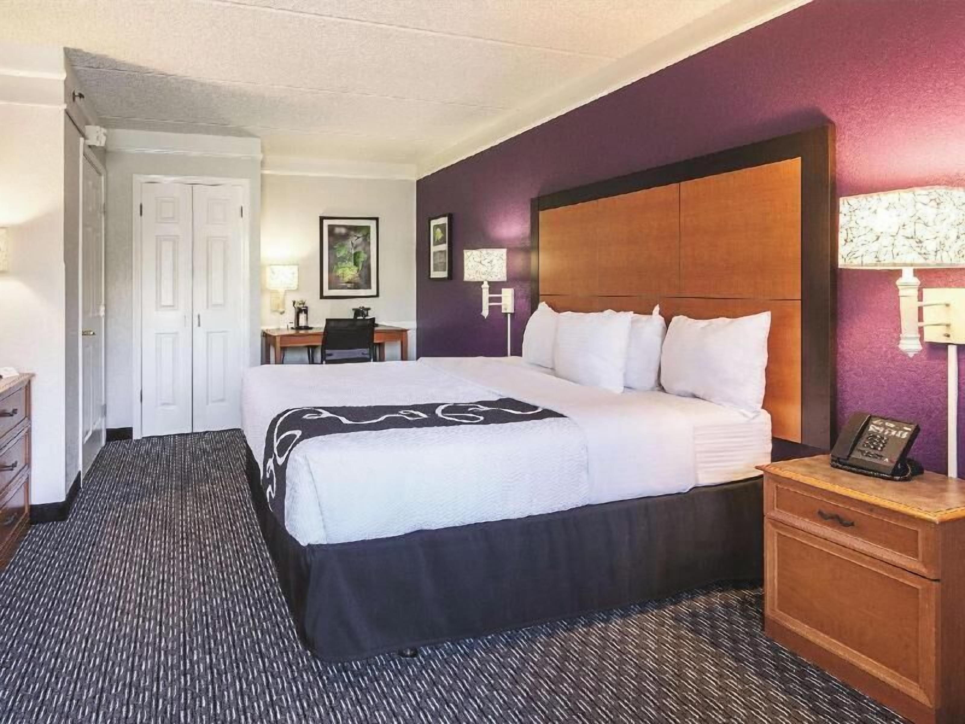 Premium bedding, desk, blackout drapes, iron/ironing board
