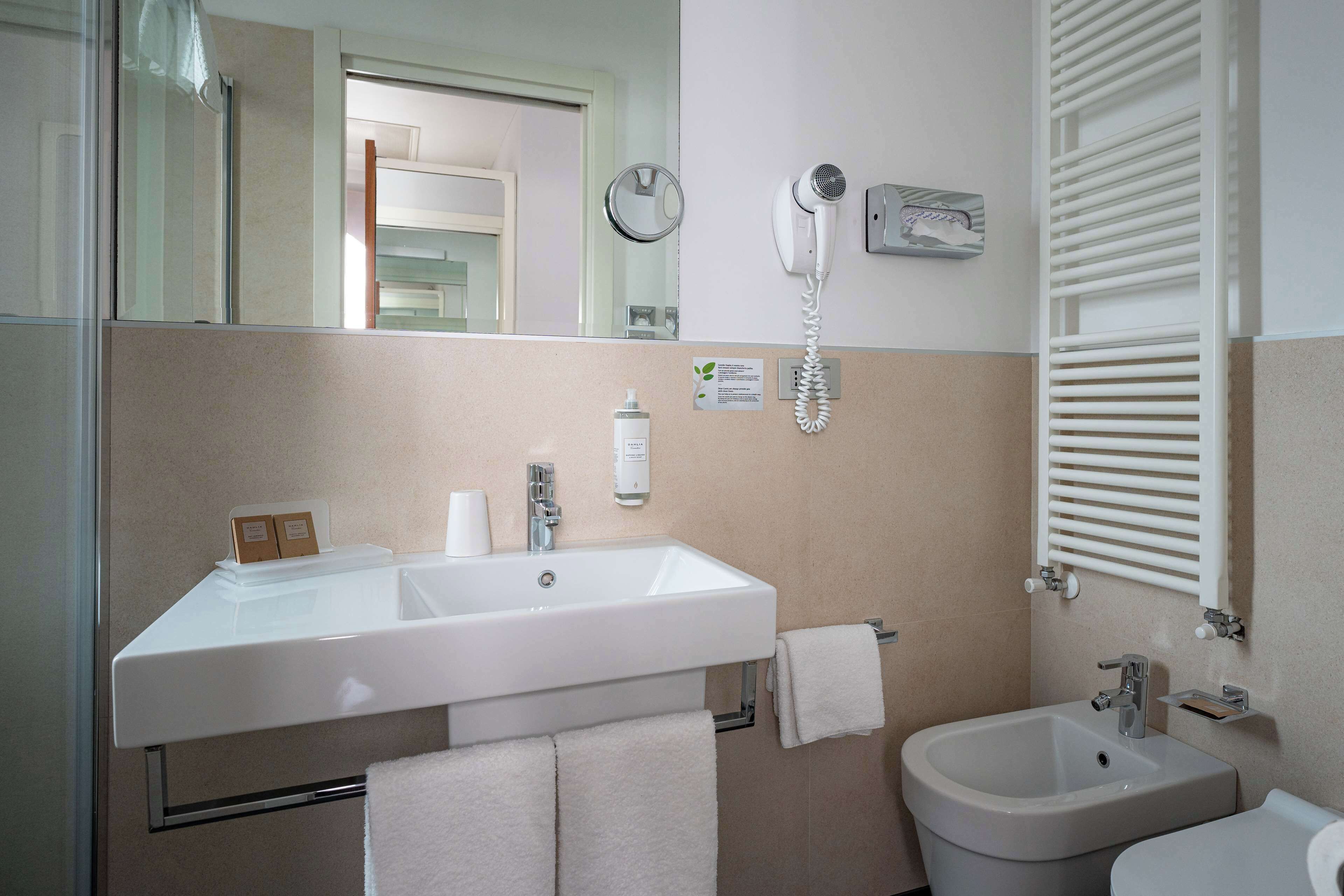 superior room, 1 king bed | bathroom | shower, eco-friendly toiletries, hair dryer, bidet