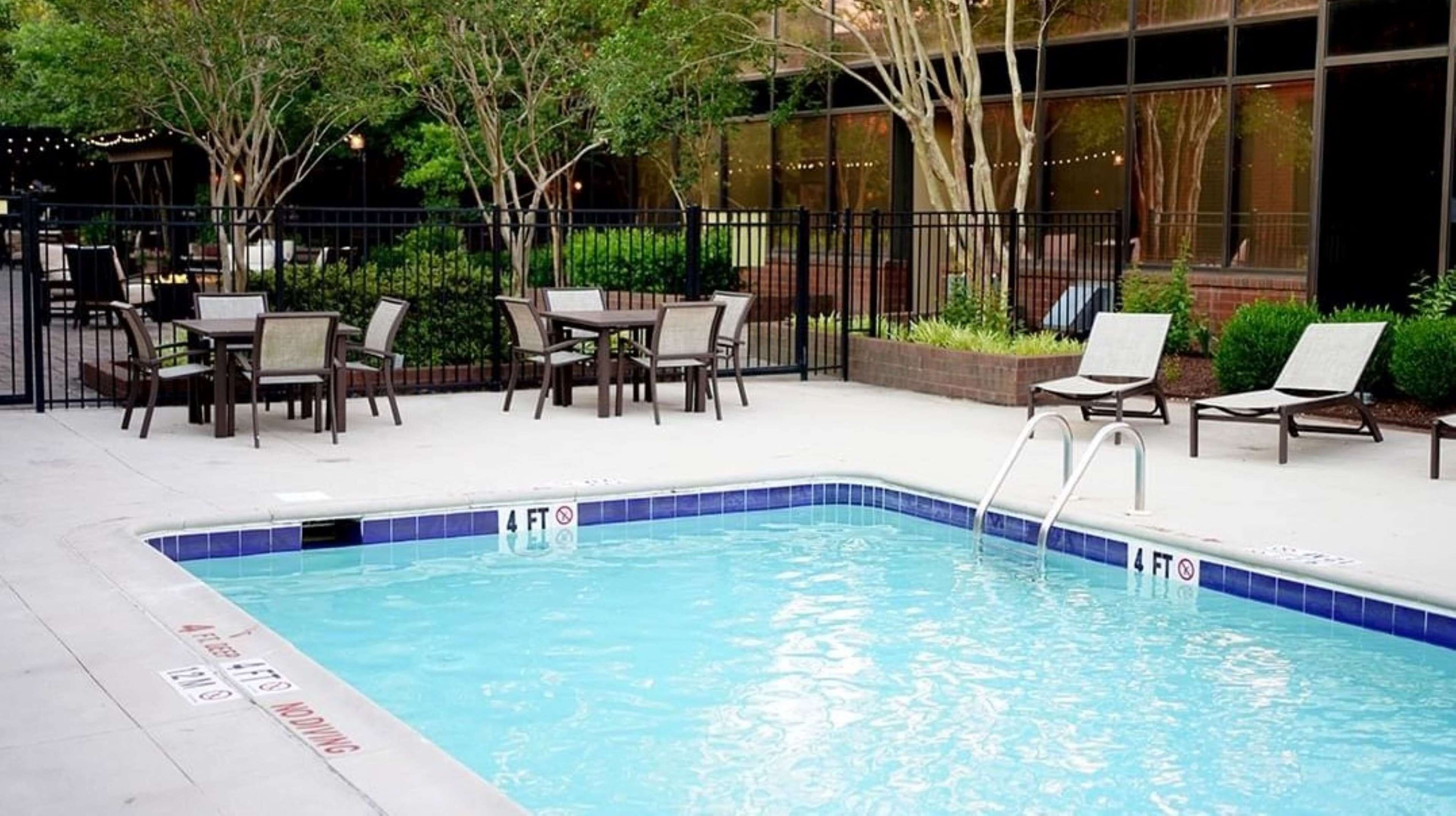 seasonal outdoor pool, open 7:00 am to 8:00 pm, free pool cabanas