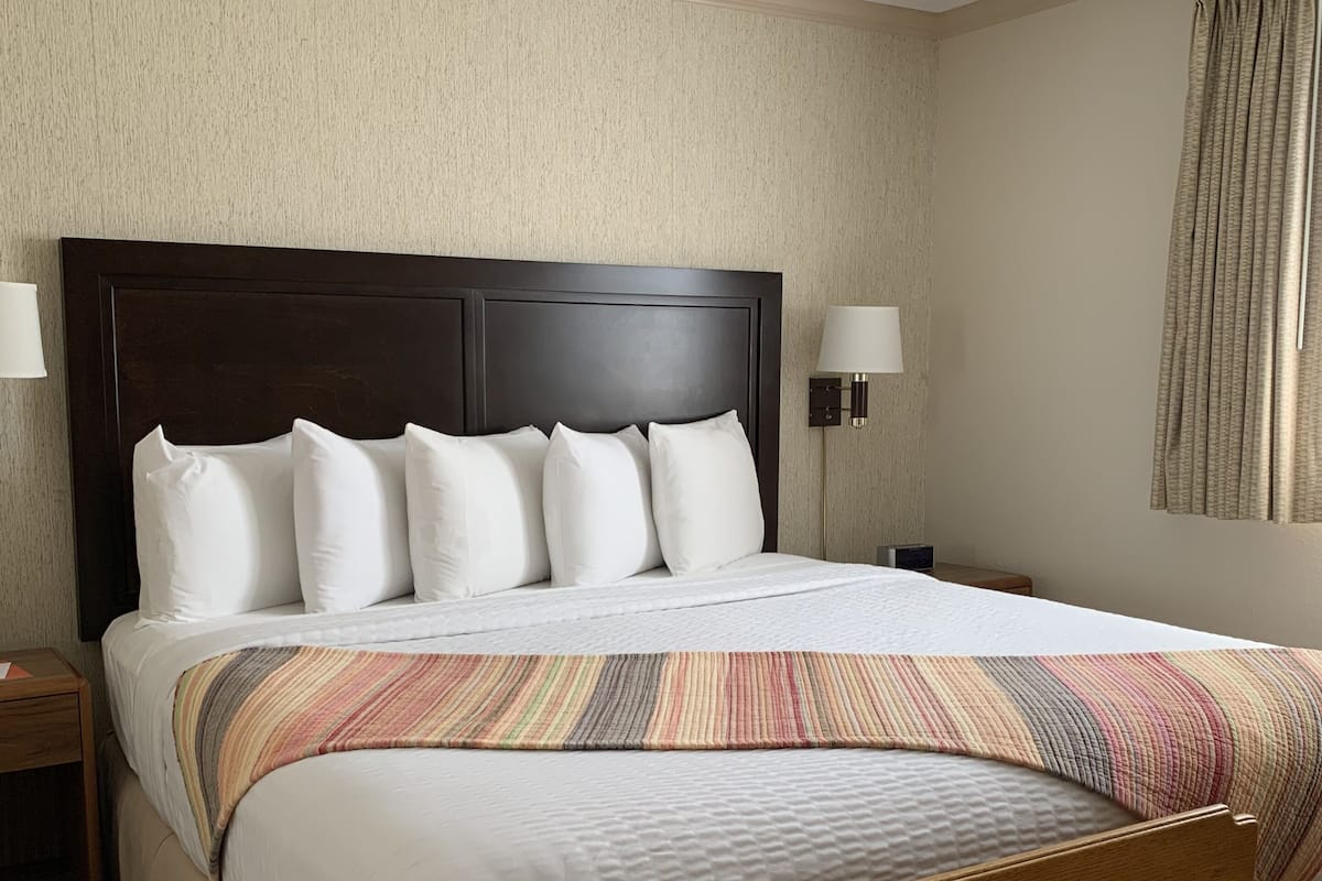 Family Suite, 1 Queen Bed with Sofa bed, Kitchenette | 1 bedroom, blackout drapes, free WiFi, bed sheets