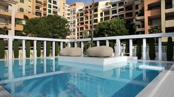 Seasonal outdoor pool, pool umbrellas, sun loungers