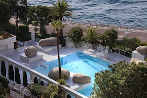 Seasonal outdoor pool, pool umbrellas, sun loungers