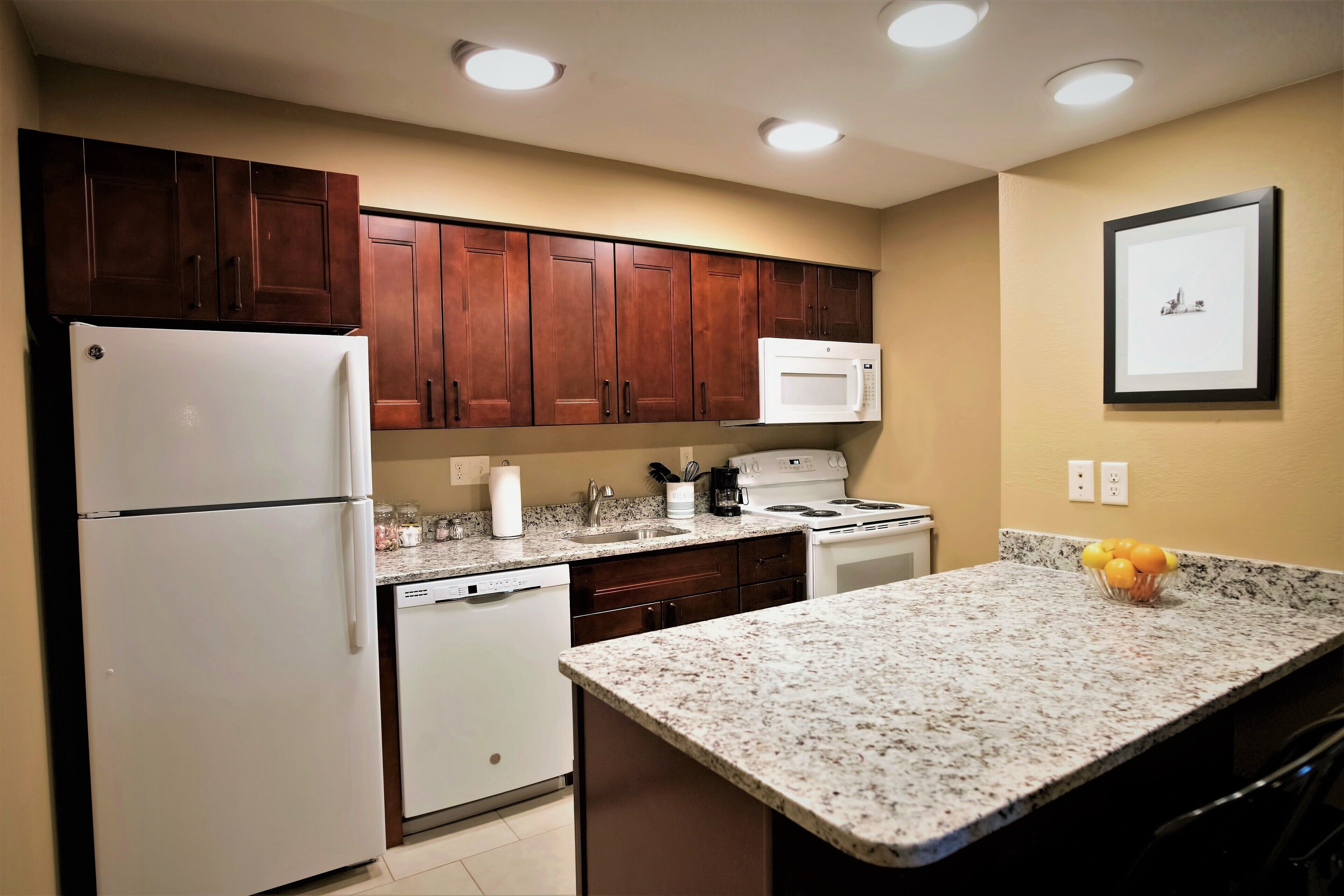 full-sized fridge, microwave, oven, stovetop