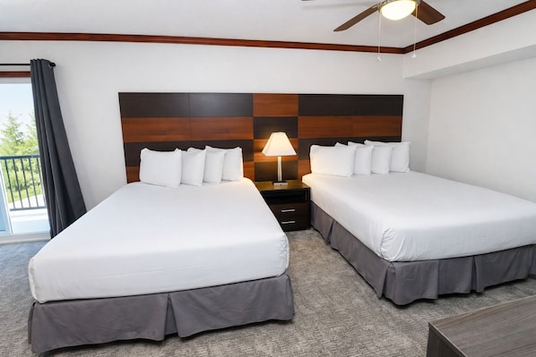 Premium bedding, pillowtop beds, desk, laptop workspace
