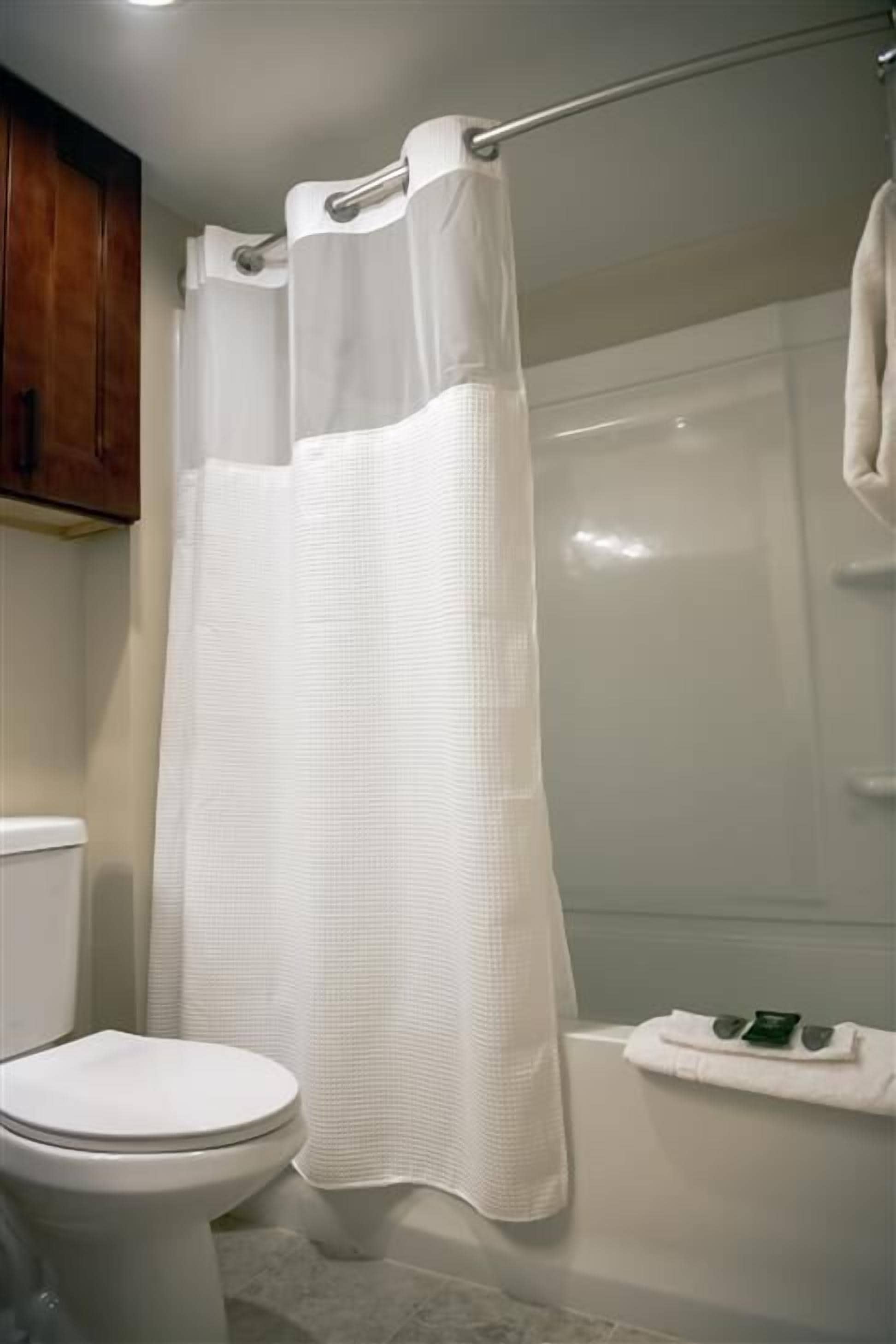 eco-friendly toiletries, hair dryer, towels