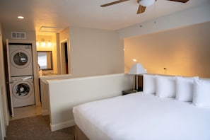 Premium bedding, pillow-top beds, desk, laptop workspace