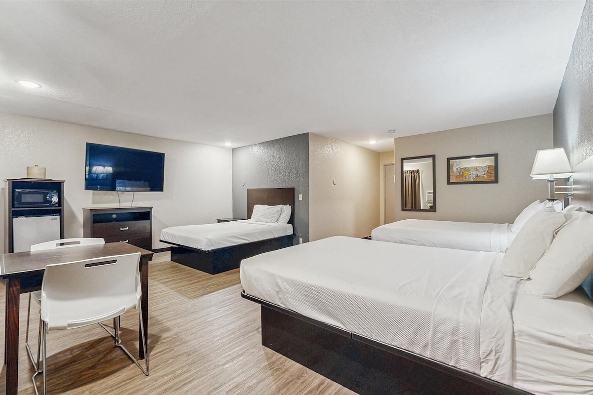 Suite, Non Smoking (3 Queen Beds) | Blackout curtains, free WiFi, bed sheets