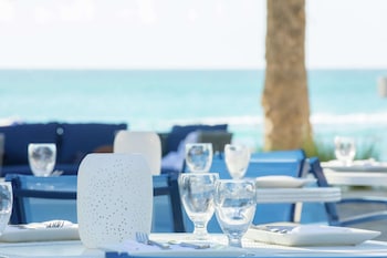 7 bars/lounges, lobby lounge, wine bar at Fairmont El San Juan Hotel
