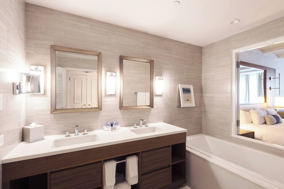 rainfall showerhead, eco-friendly toiletries, hair dryer, towels