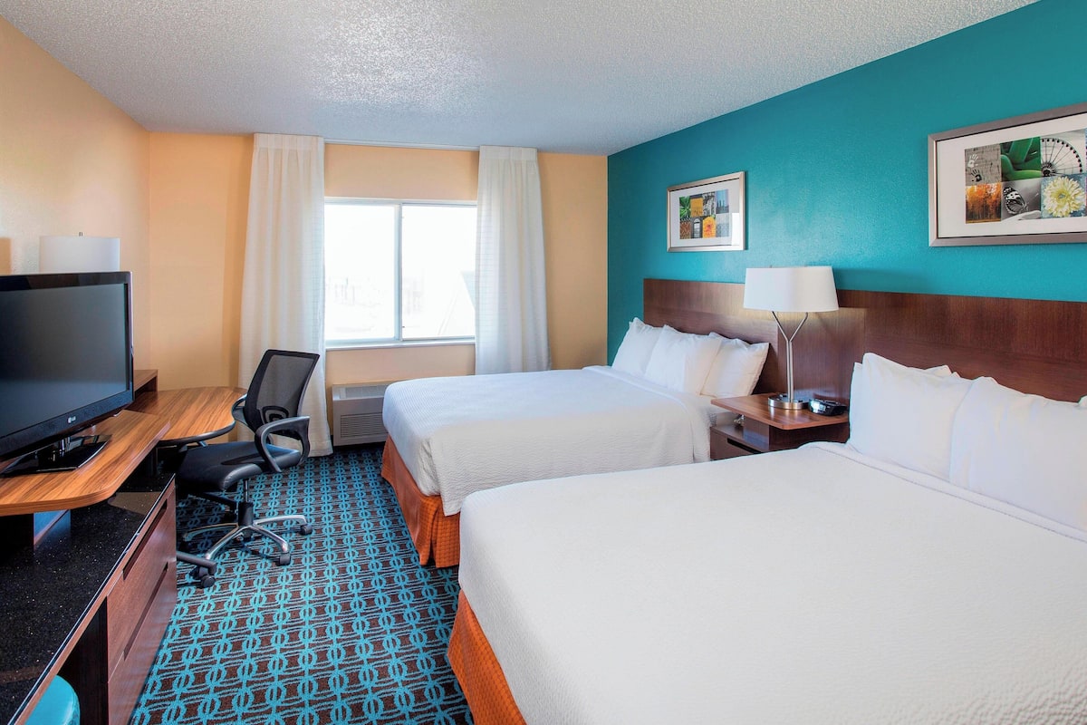 Premium bedding, pillowtop beds, desk, blackout drapes