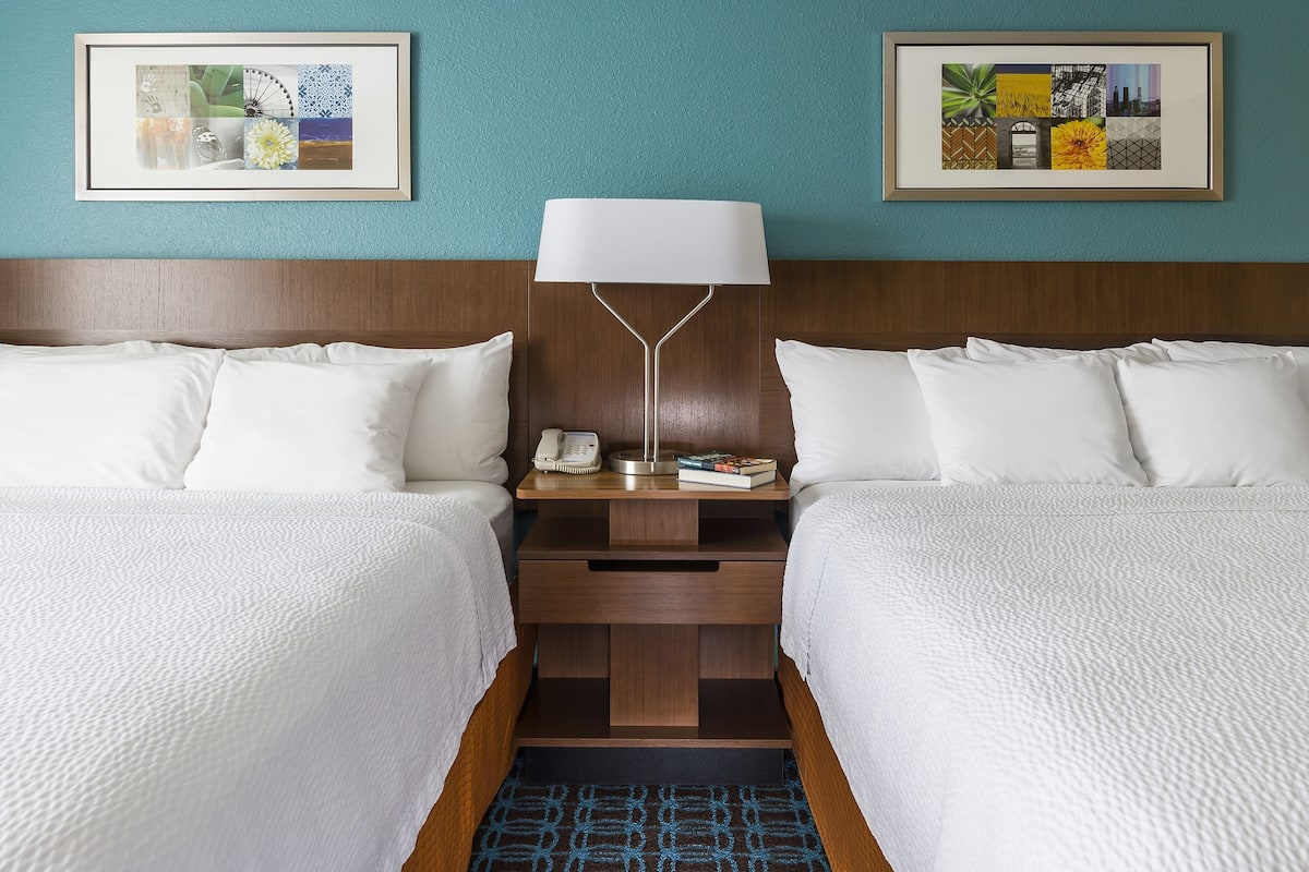 Premium bedding, pillowtop beds, desk, blackout drapes
