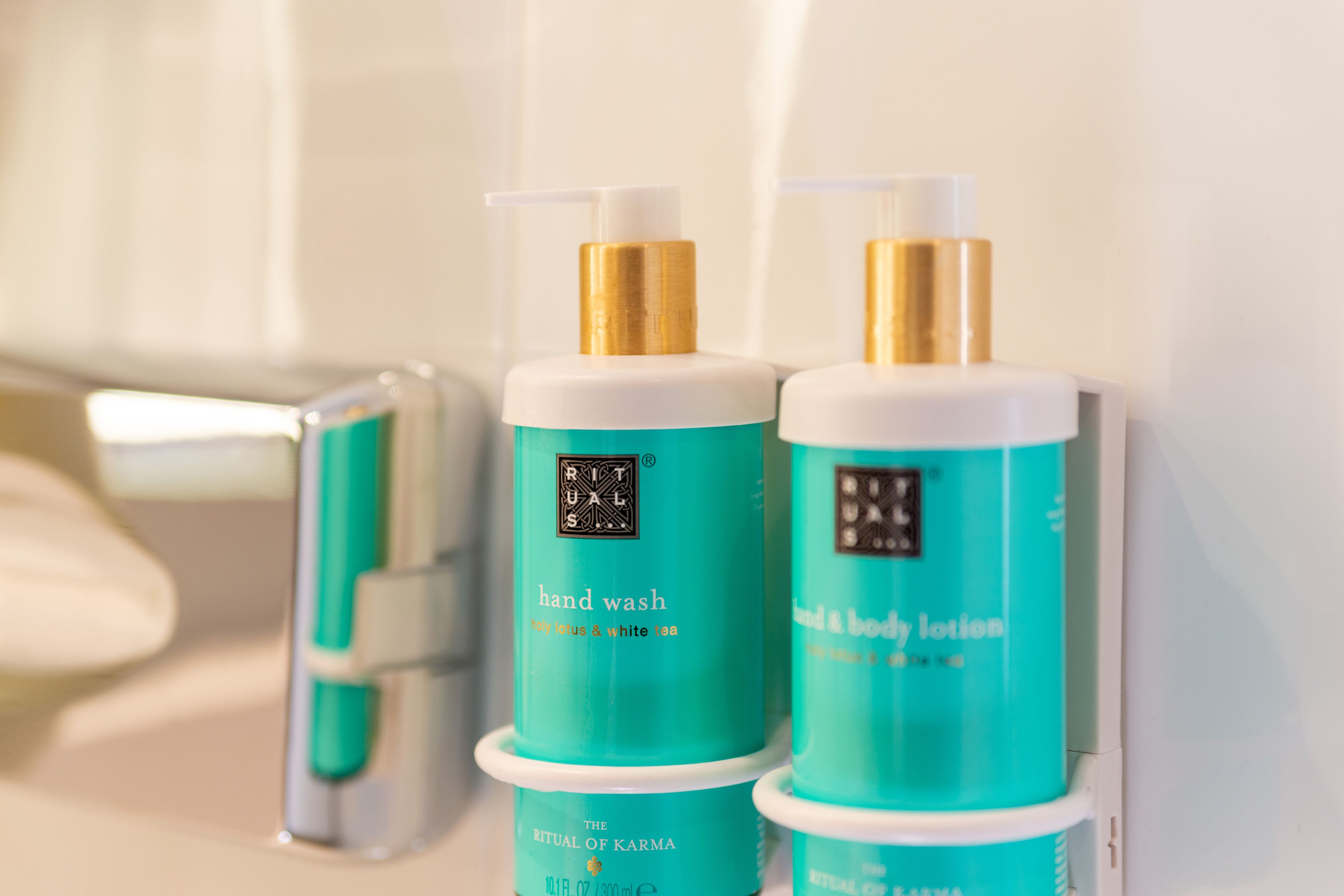 eco-friendly toiletries, hair dryer, towels