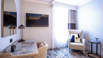 Superior Double Room | Living area | 42-inch Smart TV with digital channels, streaming services