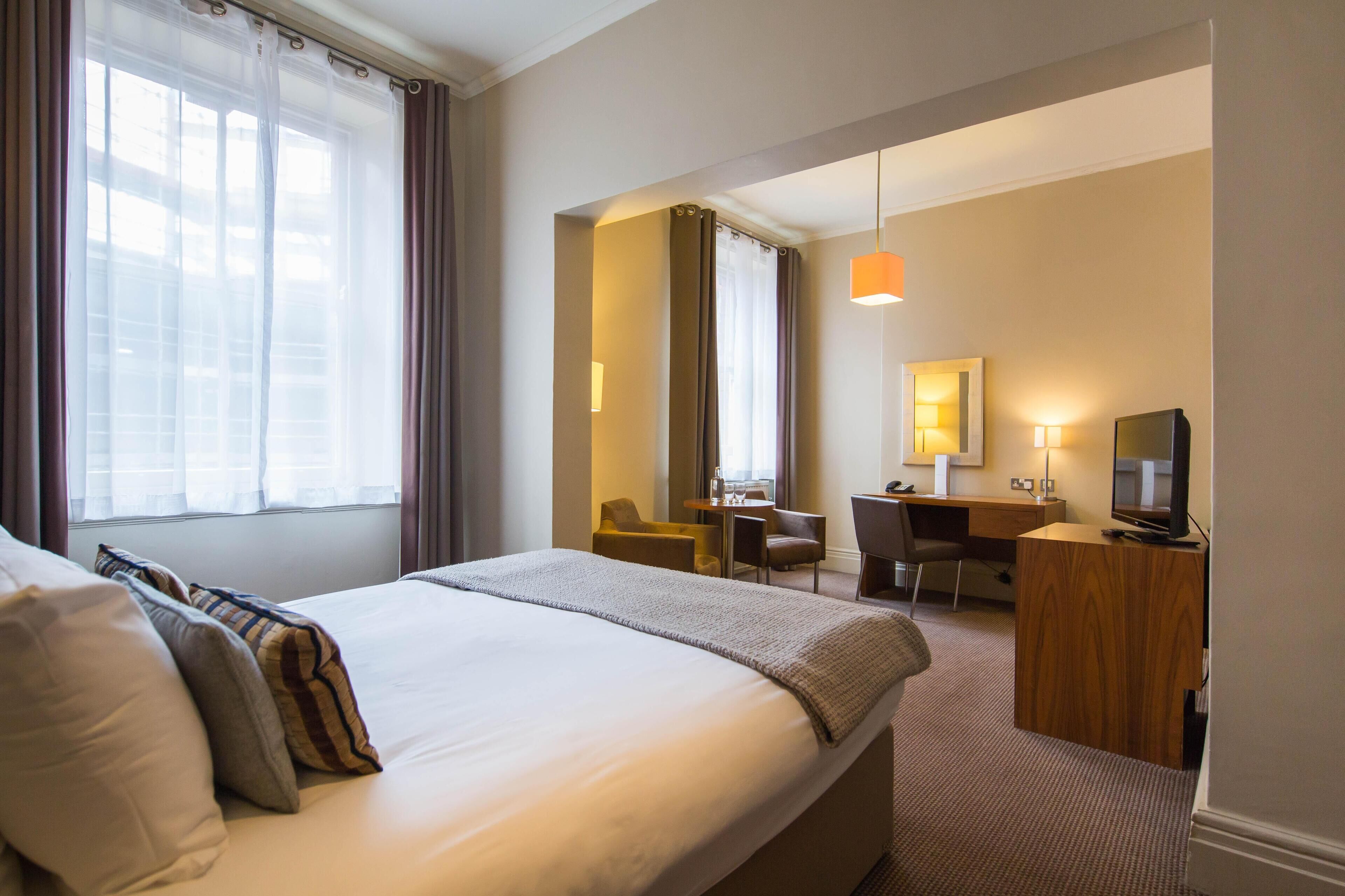 Hypo-allergenic bedding, in-room safe, desk, laptop workspace