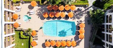 Outdoor pool, a heated pool, open 8:00 AM to 10:00 PM, pool umbrellas