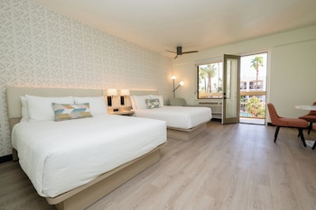 Premium bedding, in-room safe, iron/ironing board at Palm Mountain Resort and Spa