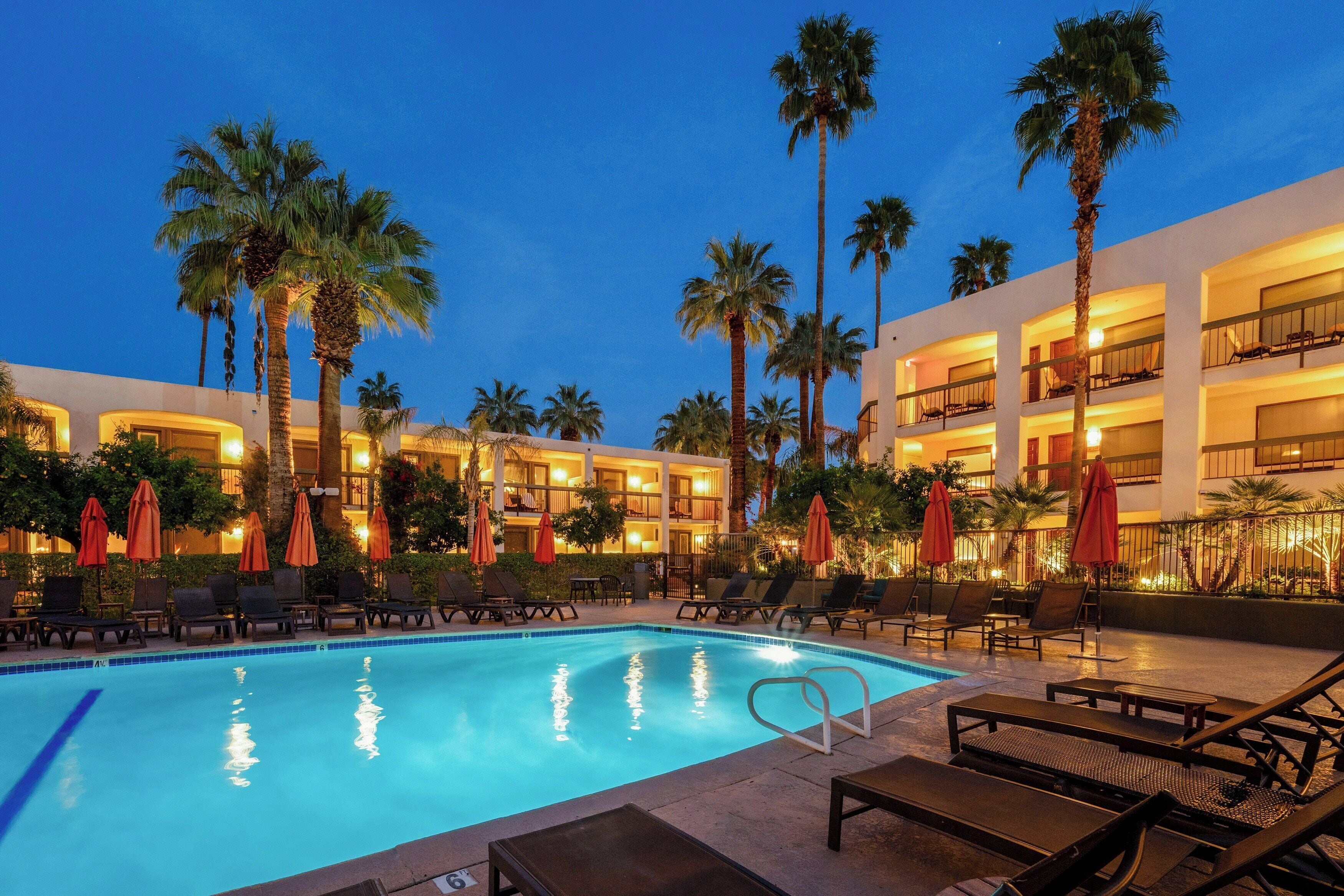 Outdoor pool, a heated pool, open 8:00 AM to 10:00 PM, pool umbrellas