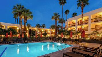 Outdoor pool, a heated pool, open 8:00 AM to 10:00 PM, pool umbrellas