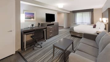 Suite, 1 King Bed, Non Smoking, Jetted Tub | Premium bedding, desk, iron/ironing board, rollaway beds