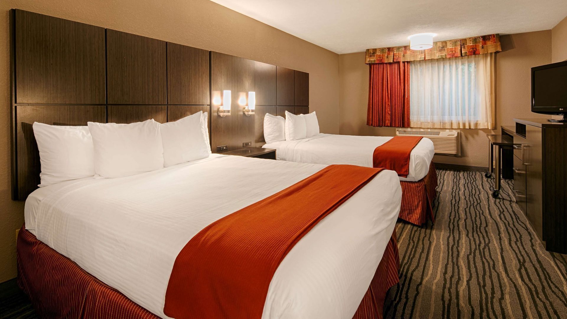 Premium bedding, desk, iron/ironing board, rollaway beds