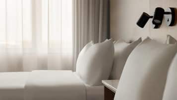 Premium bedding, memory-foam beds, in-room safe, desk