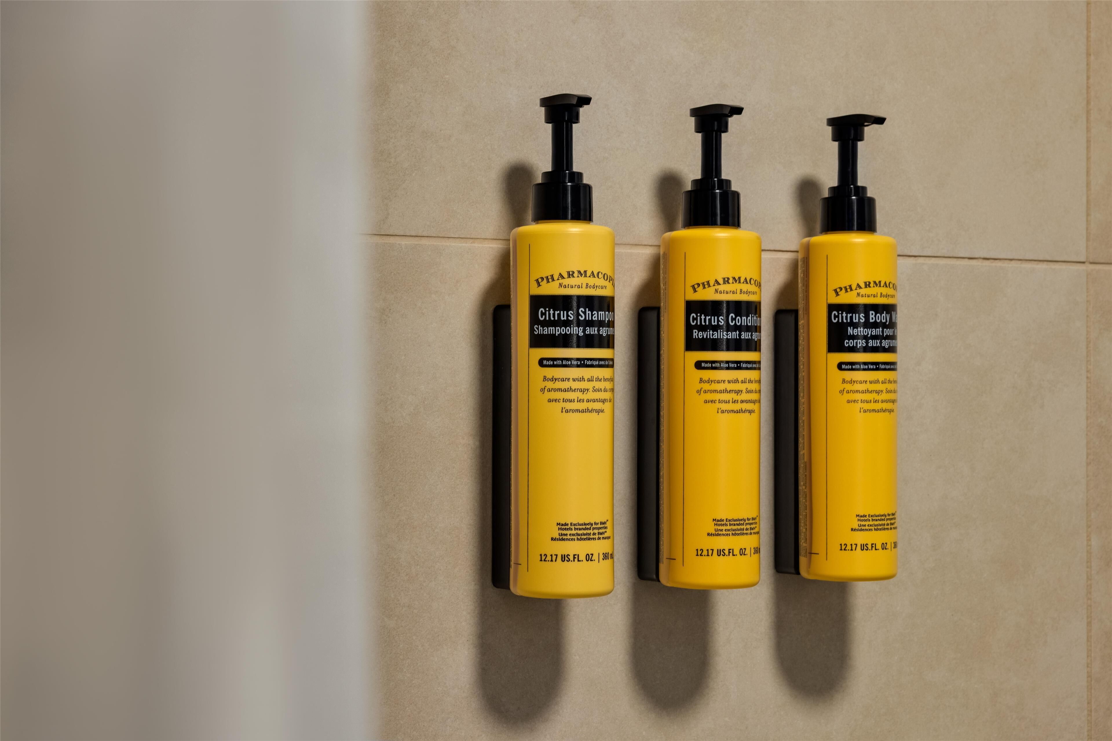 eco-friendly toiletries, hair dryer, towels