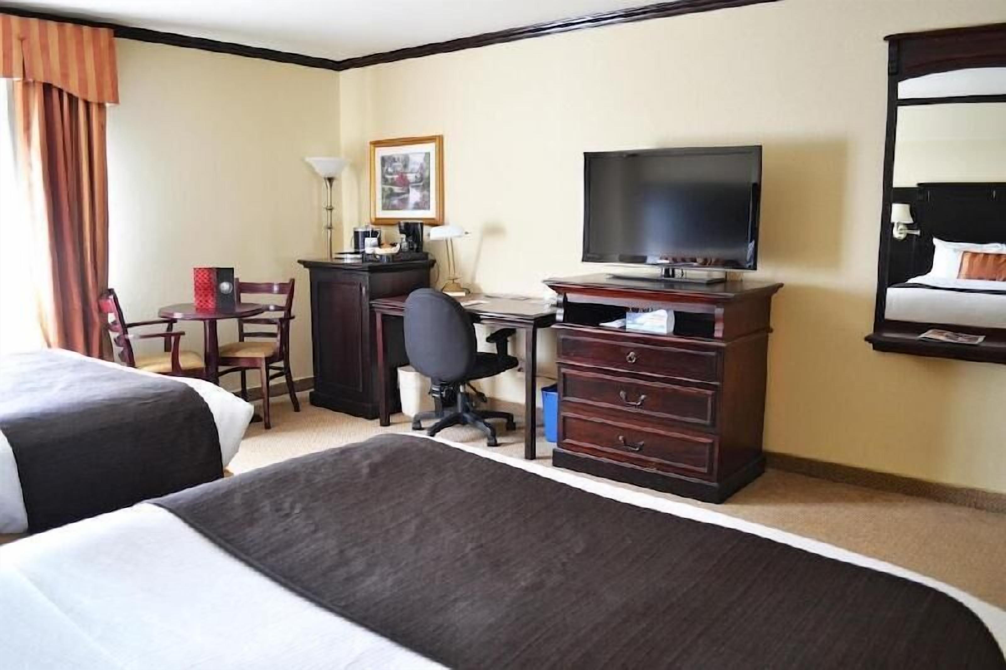 Premium bedding, memory-foam beds, in-room safe, desk