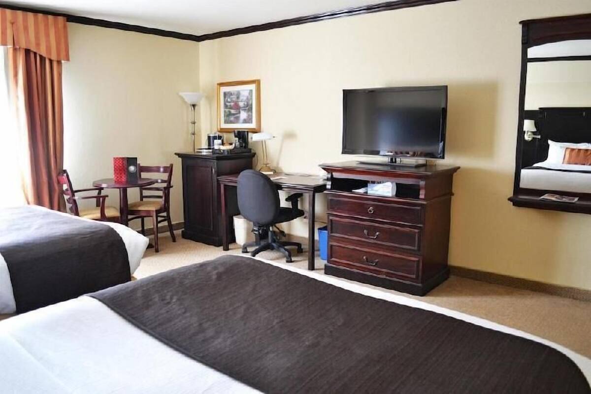 Premium bedding, memory-foam beds, in-room safe, desk