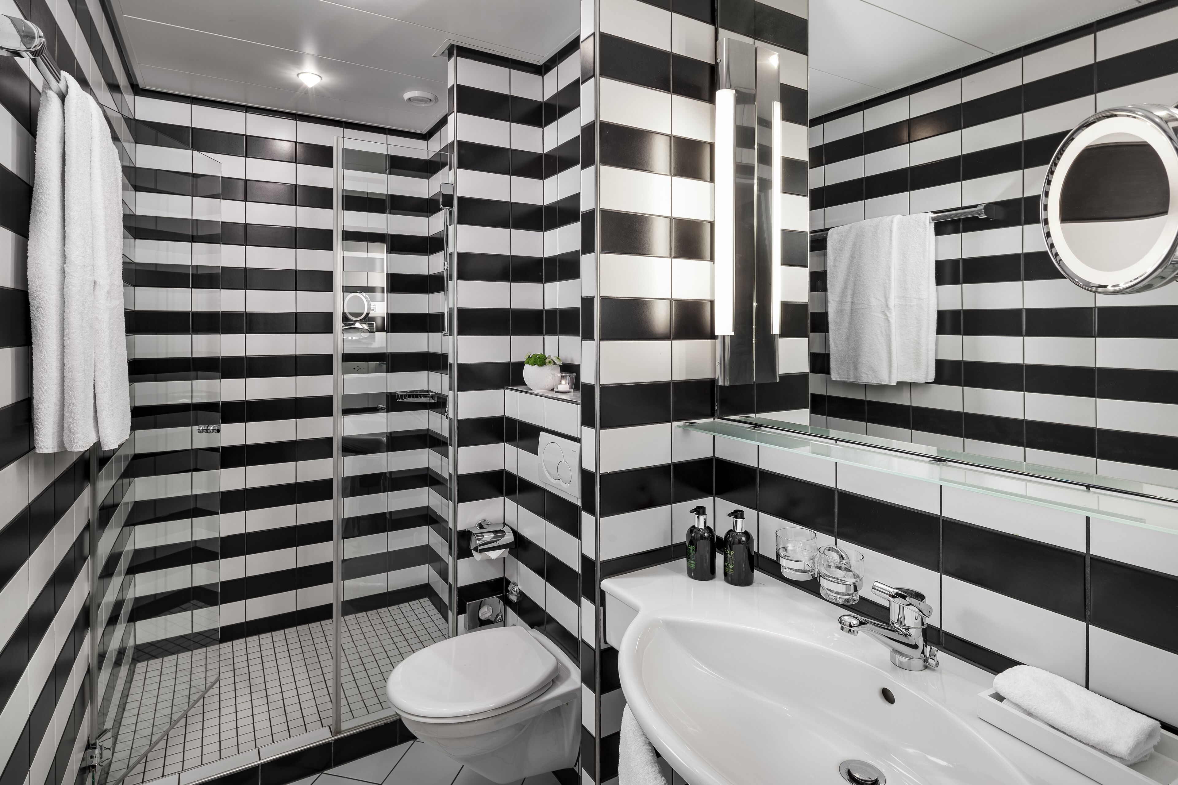 opera superior | bathroom | eco-friendly toiletries, hair dryer, slippers, towels