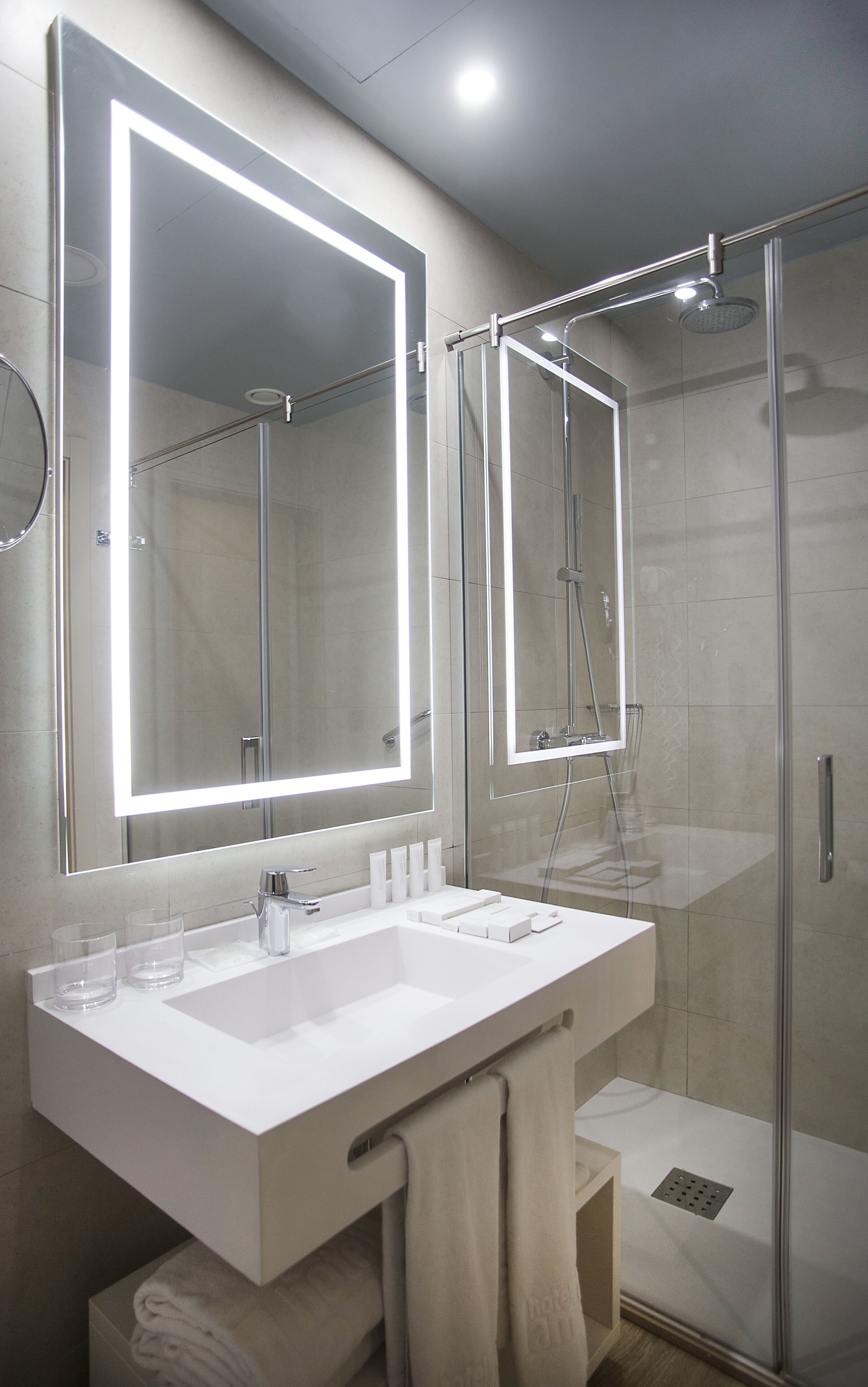 rainfall showerhead, hair dryer, bidet, towels