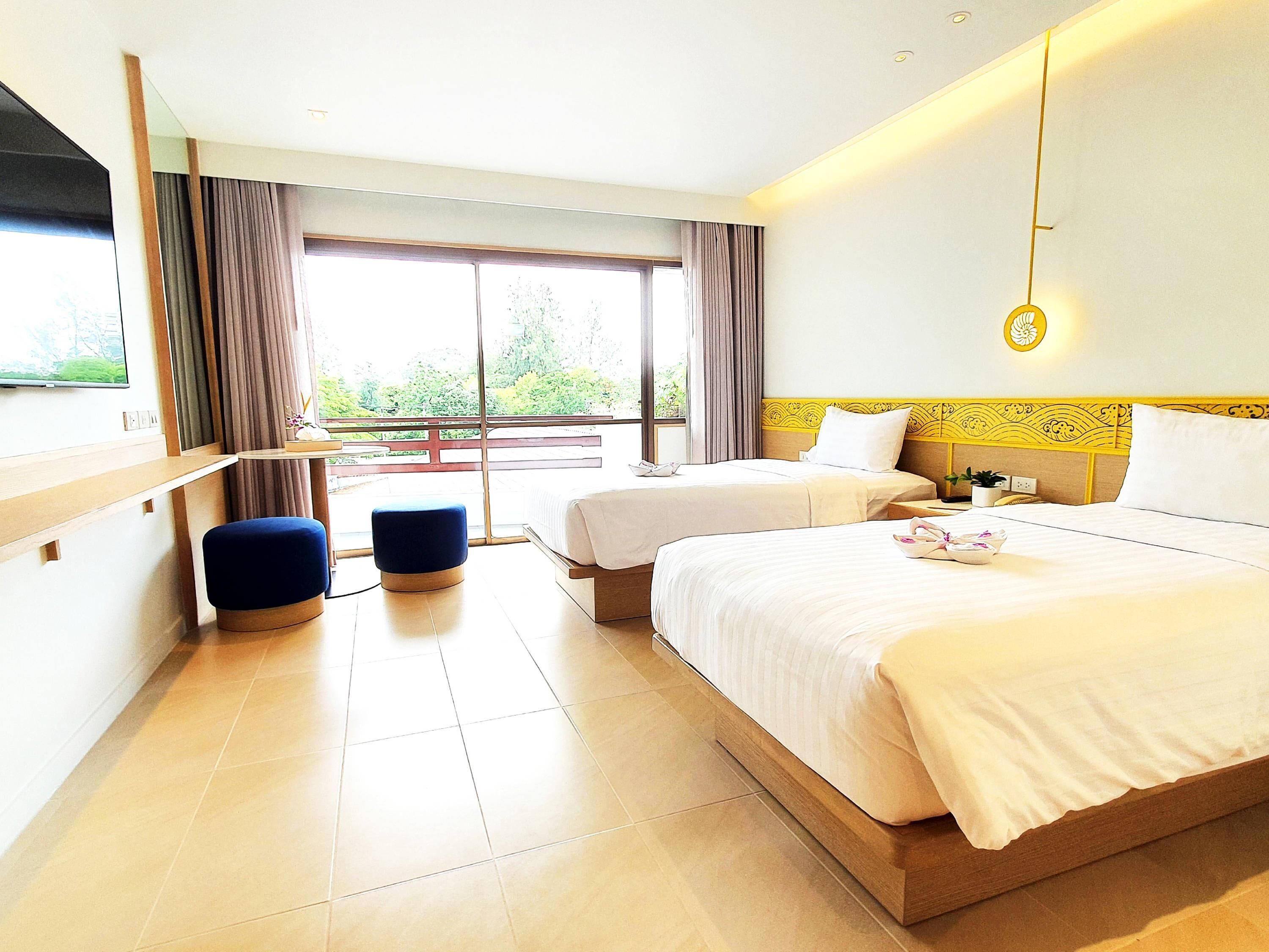 Deluxe Room, 2 Twin Beds, Garden View | Minibar, in-room safe, desk, iron/ironing board