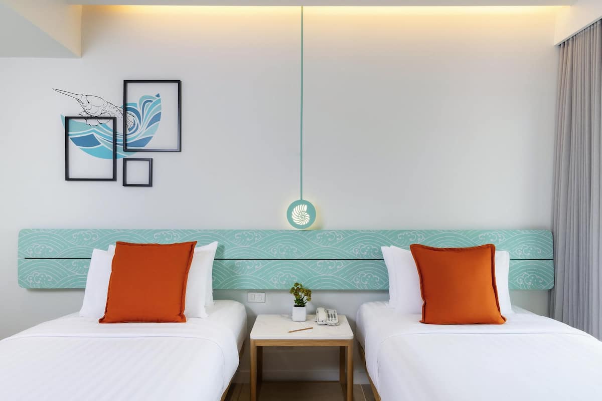 Premier Room, 2 Twin Beds, Pool View | Minibar, in-room safe, desk, iron/ironing board