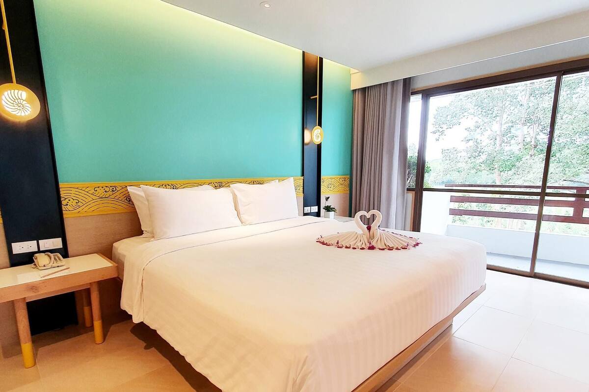 Superior Suite, 1 King Bed, Sea View | Minibar, in-room safe, desk, iron/ironing board