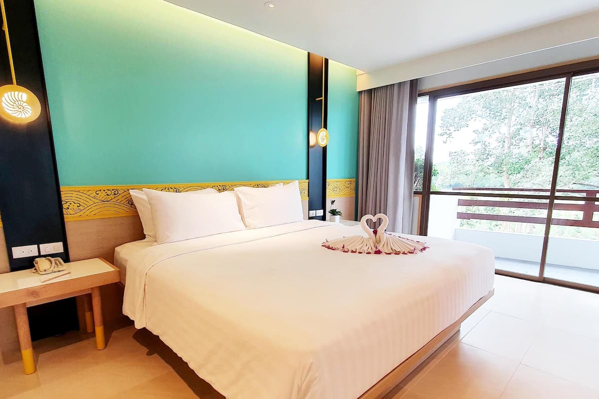 Superior Suite, 1 King Bed, Sea View | Minibar, in-room safe, desk, iron/ironing board