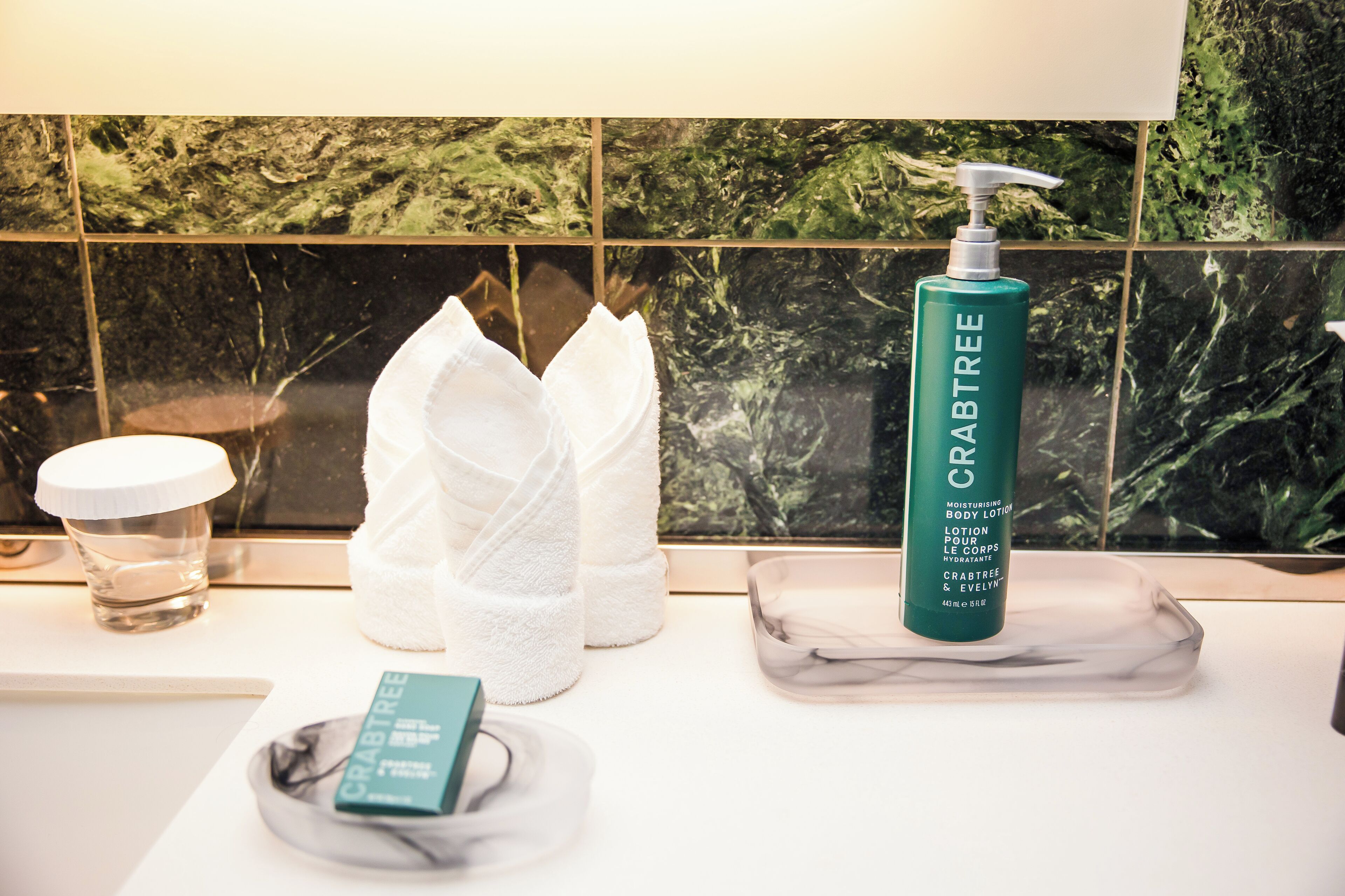 eco-friendly toiletries, hair dryer, towels, soap