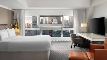 Hypo-allergenic bedding available, down comforters, in-room safe, desk
