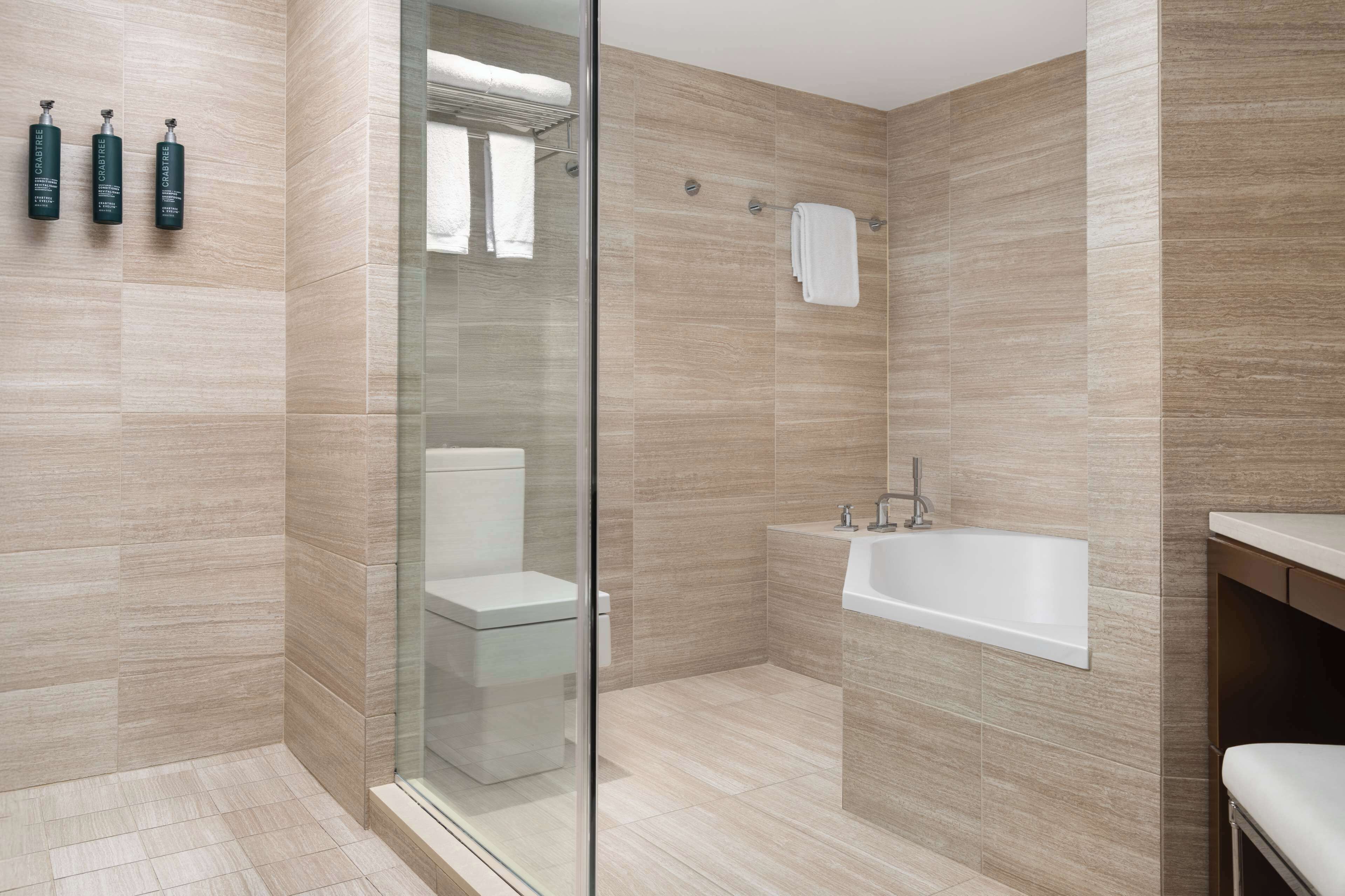 eco-friendly toiletries, hair dryer, towels, soap