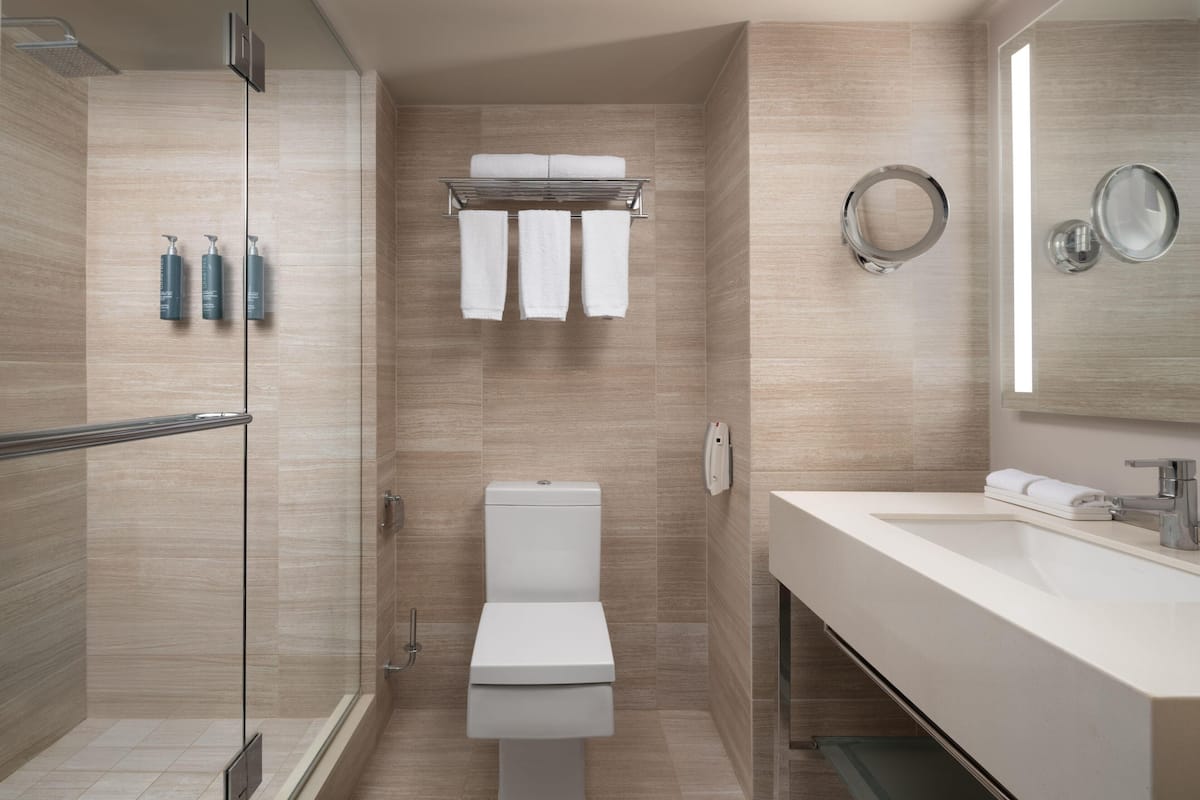 Eco-friendly toiletries, hair dryer, towels, soap