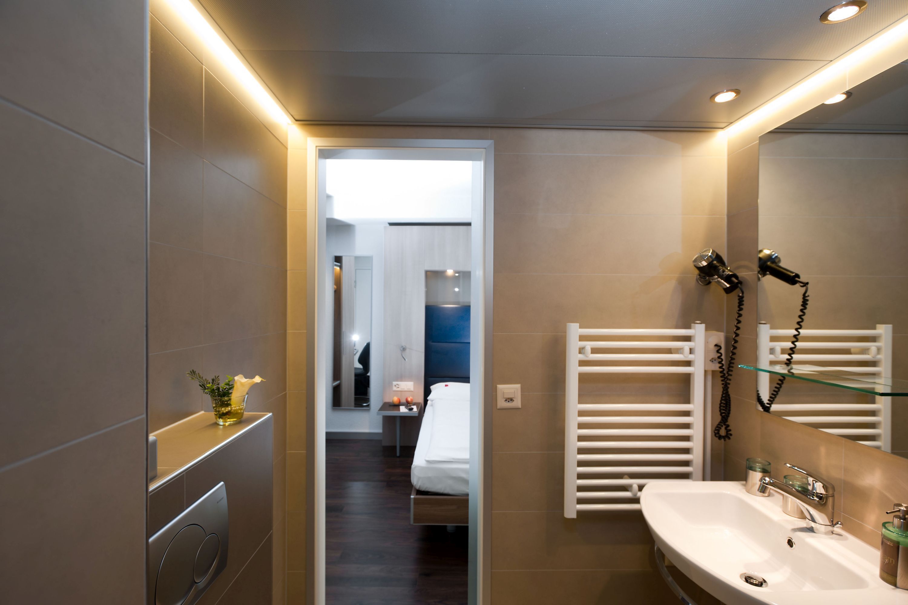 eco-friendly toiletries, hair dryer, towels, soap